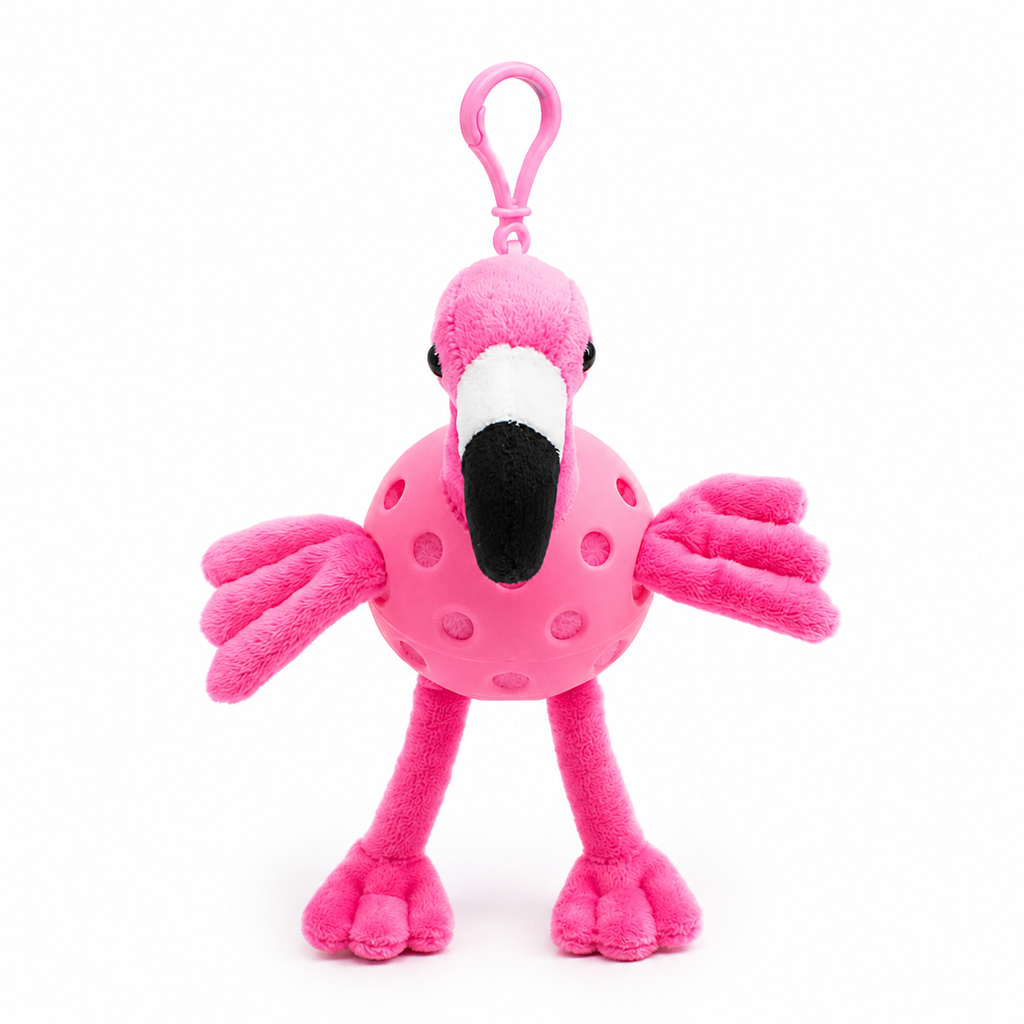 A plush flamingo toy inside a pink pickleball, attached to a pink key ring, photographed on a clean white background.