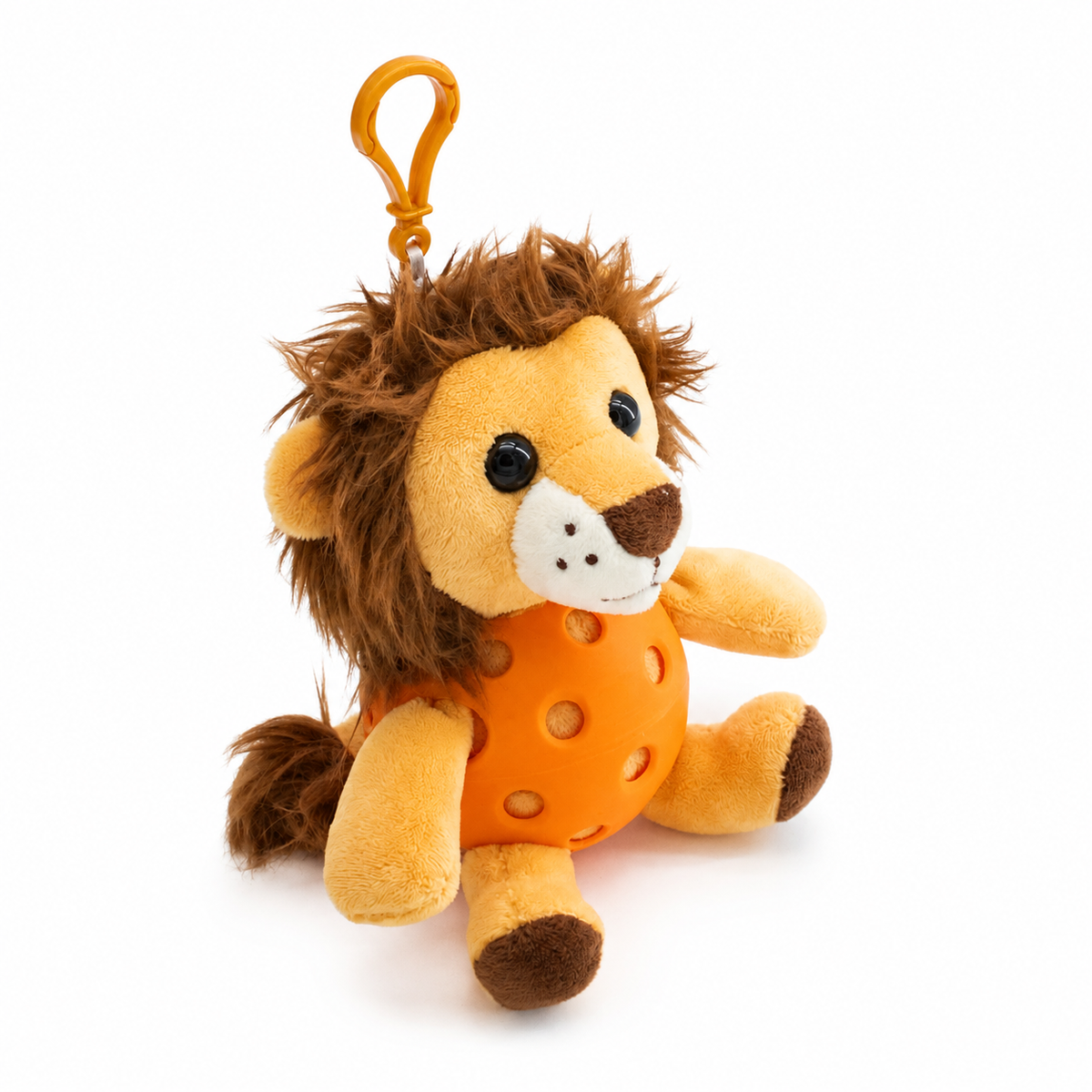 A plush lion toy inside an orange pickleball, attached to a orange key ring, photographed on a clean white background.