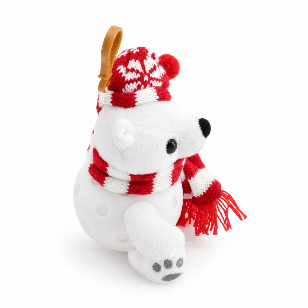 A white plush polar bear keychain wearing a red and white knit Santa hat and matching scarf, attached to a gold metal clip, on a white background.