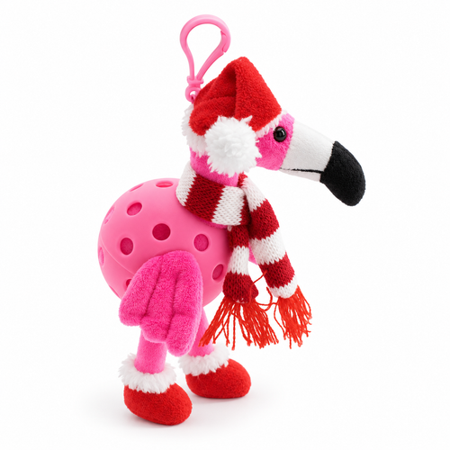 A pink plush flamingo toy with a Santa hat, red and white striped scarf, and red boot covers, photographed on a clean white background.